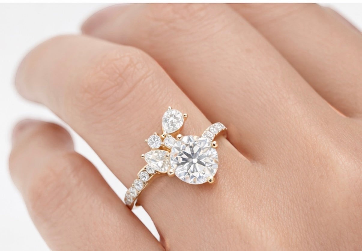 Vikchi Sonaire Rhea 14K yellow gold ring with 1ct round center diamond and 2.2ctw accent diamonds in floral cluster.