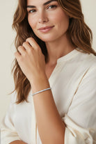 Vikchi 5ctw lab diamond tennis bracelet in 14kt white gold with round brilliant cut stones.