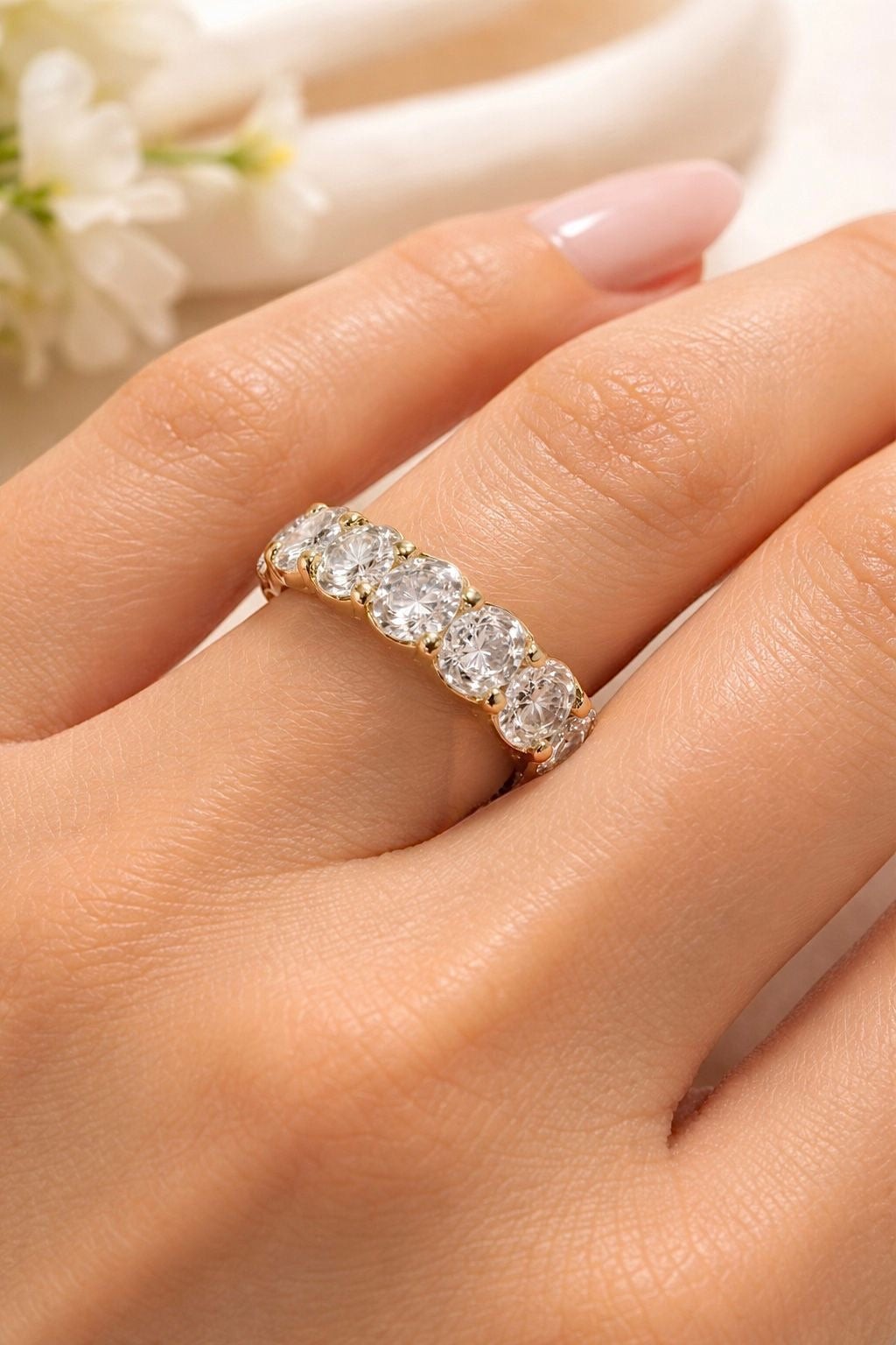 Vikchi Isola Vira oval diamond eternity band in 14K yellow gold, 8ctw, shared prong setting.
