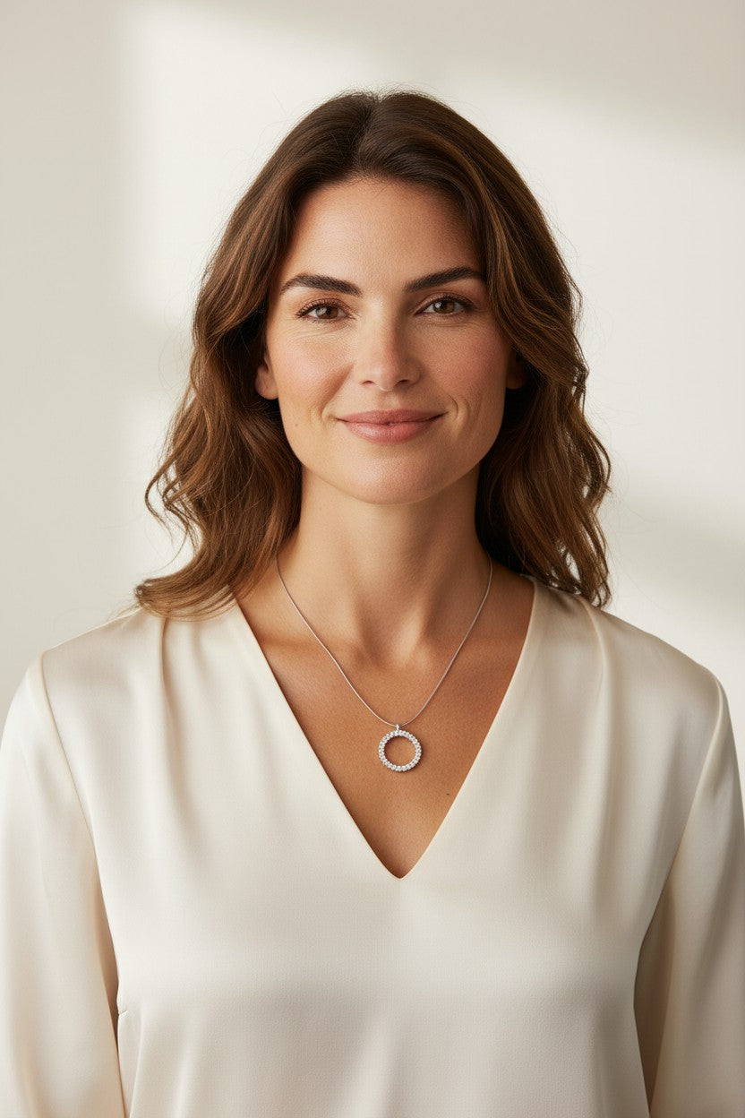 Vikchi Sonaire Orion necklace: 14kt white gold circle pendant with 0.25ctw lab-grown diamonds on a snake chain.