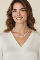 Vikchi Isola Vira Cala 14kt white gold necklace with 14ctw marquise cut lab-grown diamonds in a vine-inspired setting.