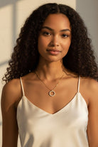 Vikchi Sonaire Orion necklace: 14kt yellow gold circle pendant with lab-grown diamonds on a snake chain.